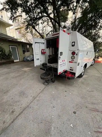Magnet Plumbing service vehicle on-site for Grease Trap Cleaning in Boulevard Forest